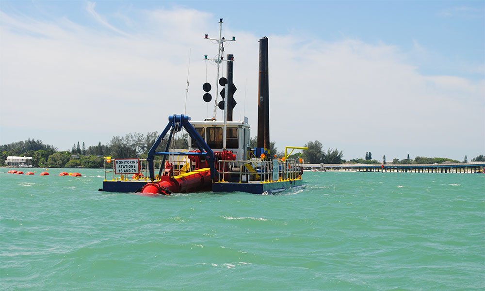 an Ellicott series 970 / 1170 in Sebastian Inlet's teal green water