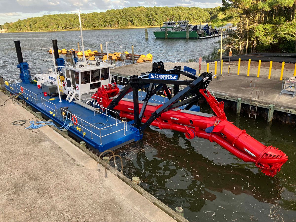 a docked ellicott dragon dredge model 1870