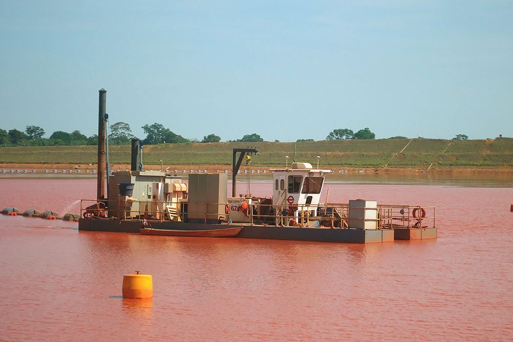 Electric dredge in lake