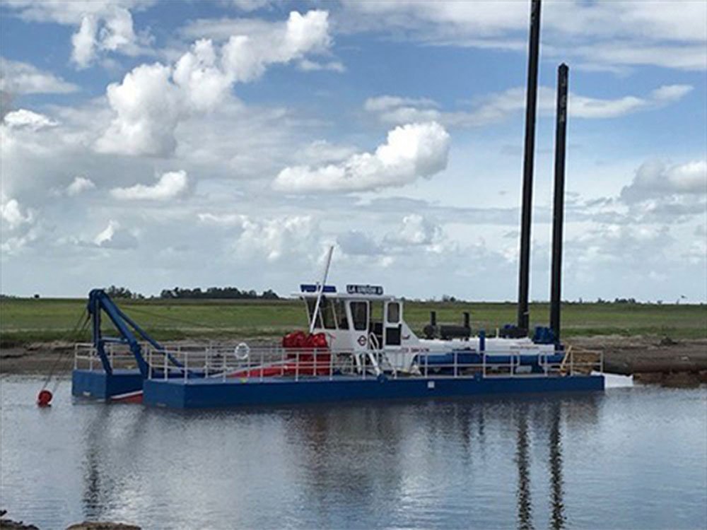an ellicott series 1270 dragon dredge in a river in argentina